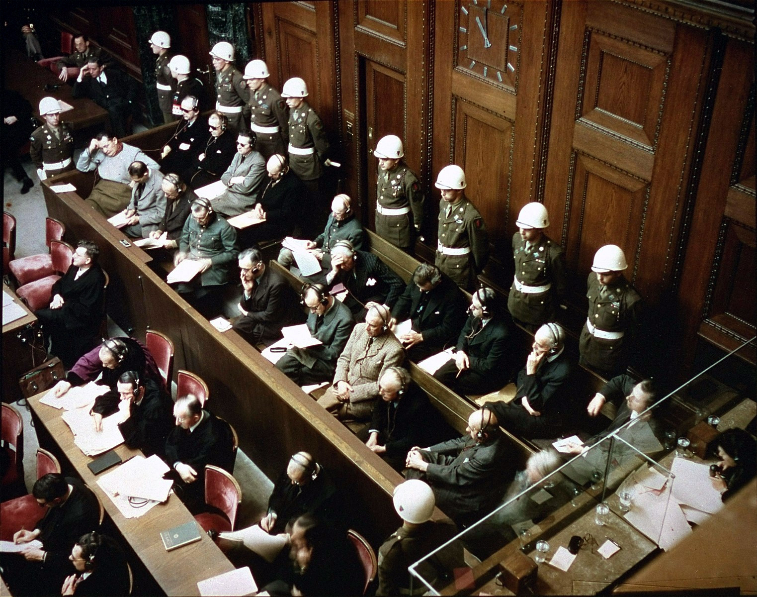 Which later defendant in the Nuremberg Trials posed happily for photographers, drank champagne and chatted with American officers after his capture near the end of World War II?