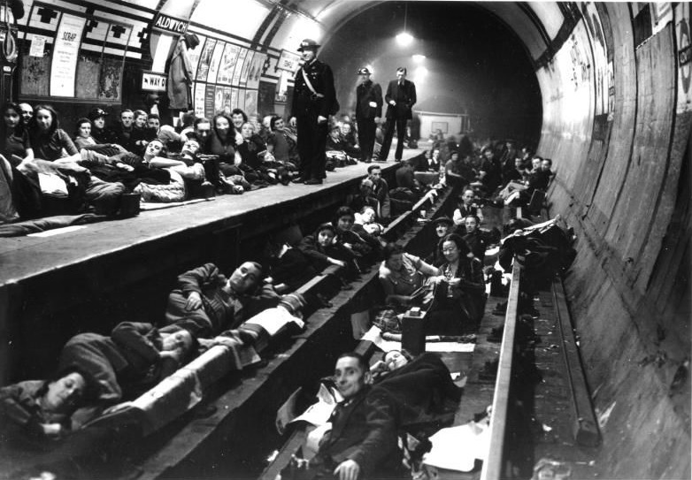 Bethnal Green tube station in London was the site of 173 deaths in March 1943. What caused the disaster? (Photo depicts a different station.)