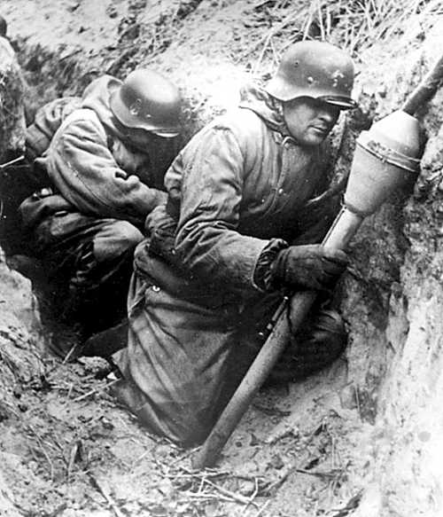 Which version of the famous and ubiquitous German Panzerfaust was designed with a pistol grip for easier use? (Photo does not necessarily depict the correct answer.)