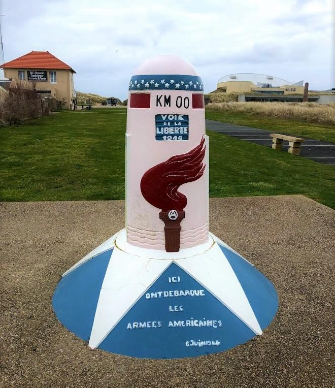 The Liberty Road is a commemorative route marking the Allied liberation of Europe. Where does it begin?